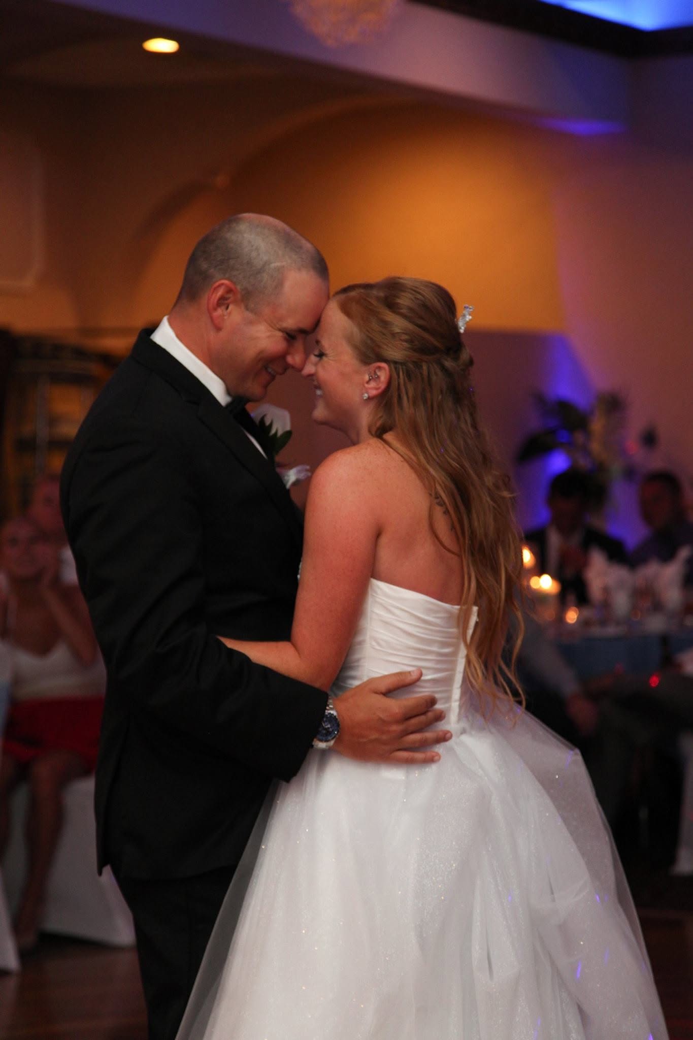 Lauren and Brandon sharing a dance at their wedding reception